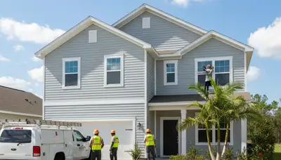 Vinyl siding installation by professional contractors in Jacksonville FL residential home exterior